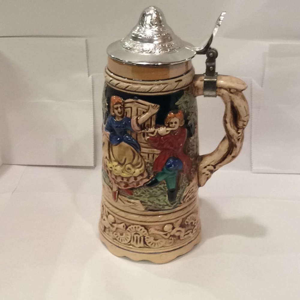 Vintage German music box beer stein